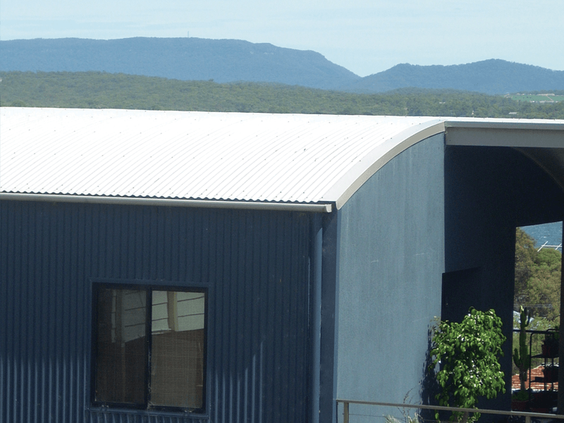 Image of 0.60 Corodek installed on a curved roof.