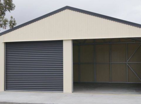 Shed with two roller doors, one open and one closed