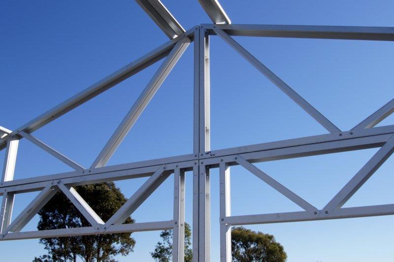 Photo of a portion of stud framing in a building.