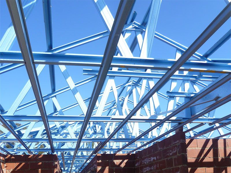 Photo of ceiling battens from inside looking up during construction.