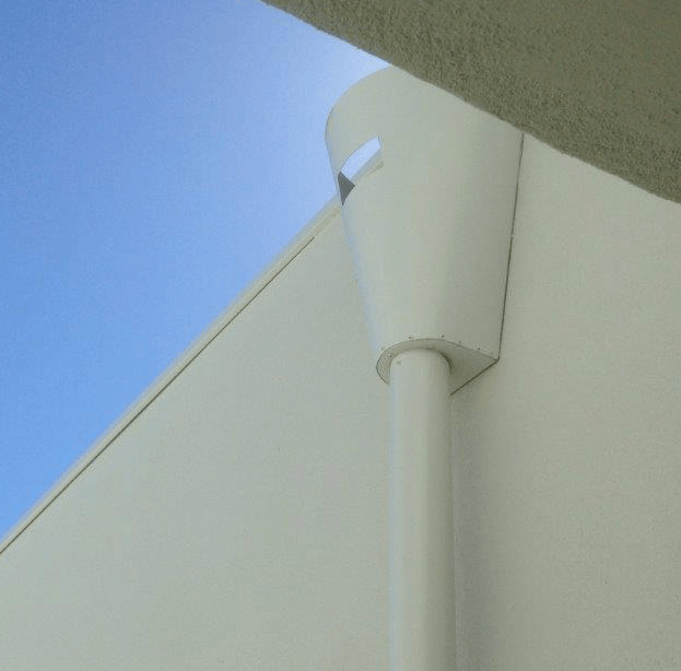 photo of a rain head in situ on a house.