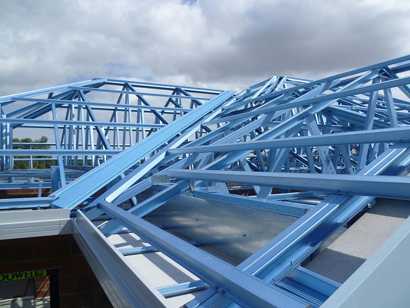 Close up photo of a house roof made from steel battens and trusses
