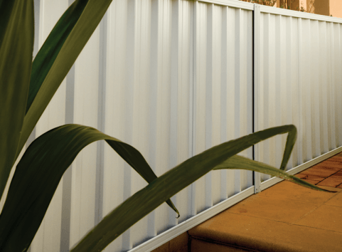 Installed Trimclad Colourbond fence in Surfmist